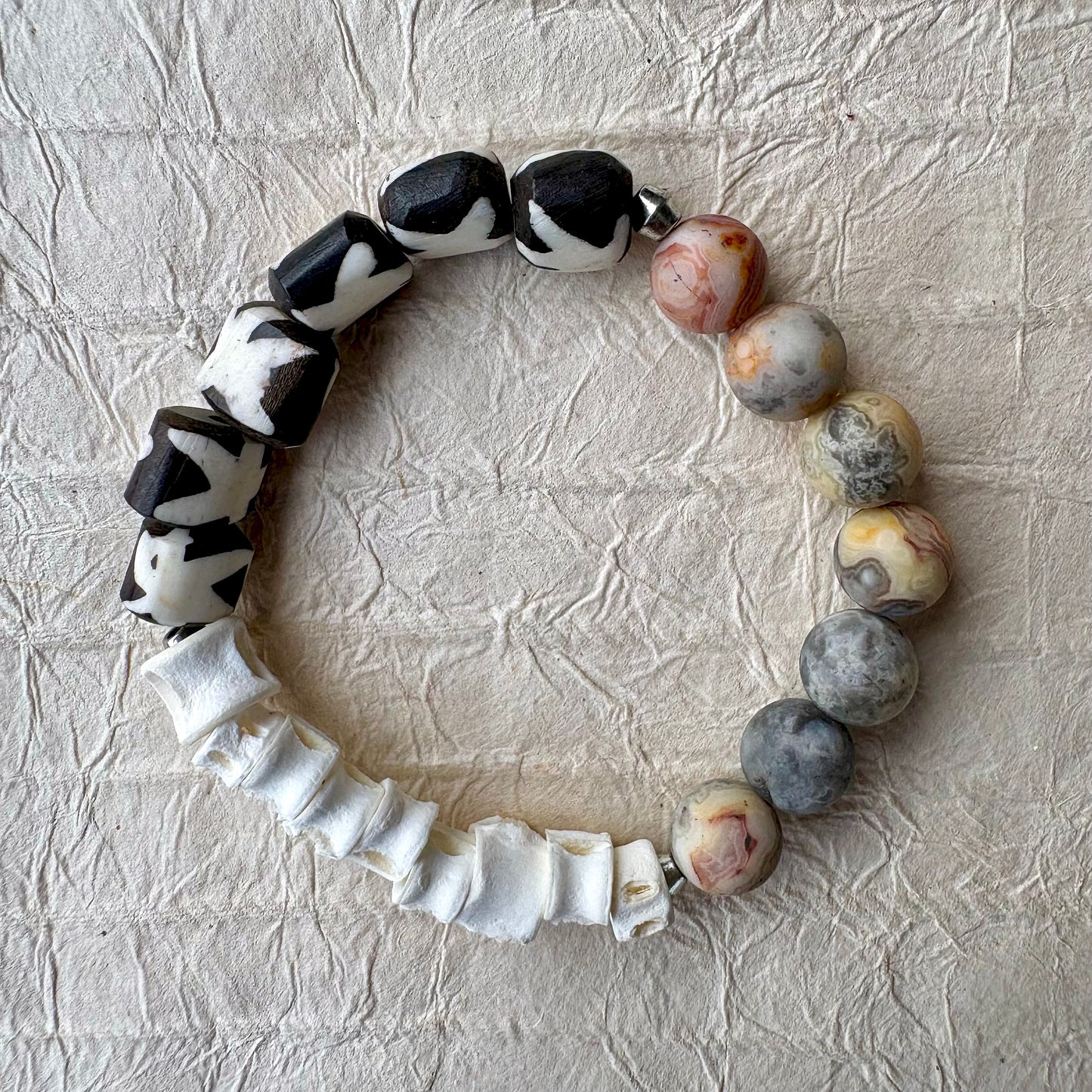 beaded bracelet with gemstones and stained bone beads